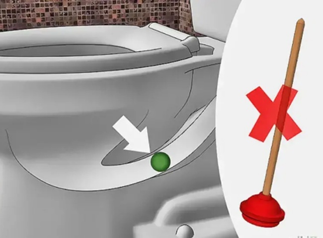 Bồn cầu bị tắc bởi vật cứng